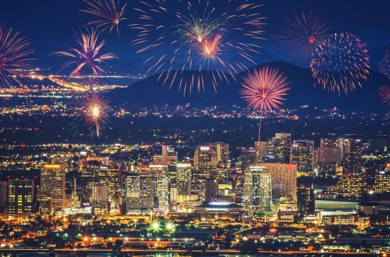 city skyline with fireworks
