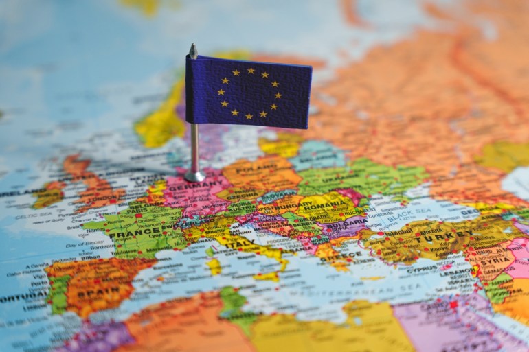 European Union flag on Europe map.